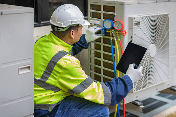 Professional Heat Pump Repair technician working in Clifford, IN